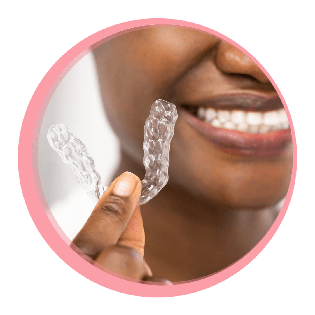 close of of clear night guard with person smiling in background