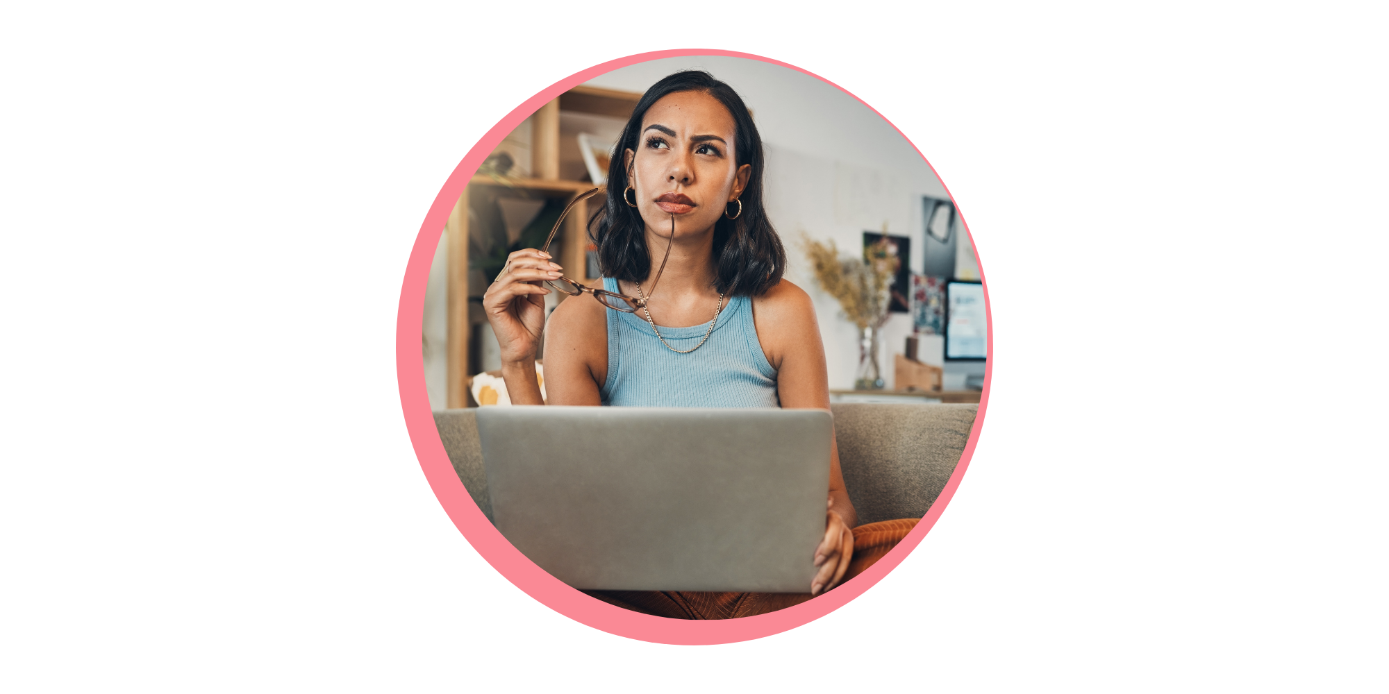 Woman deep in thought holding glasses