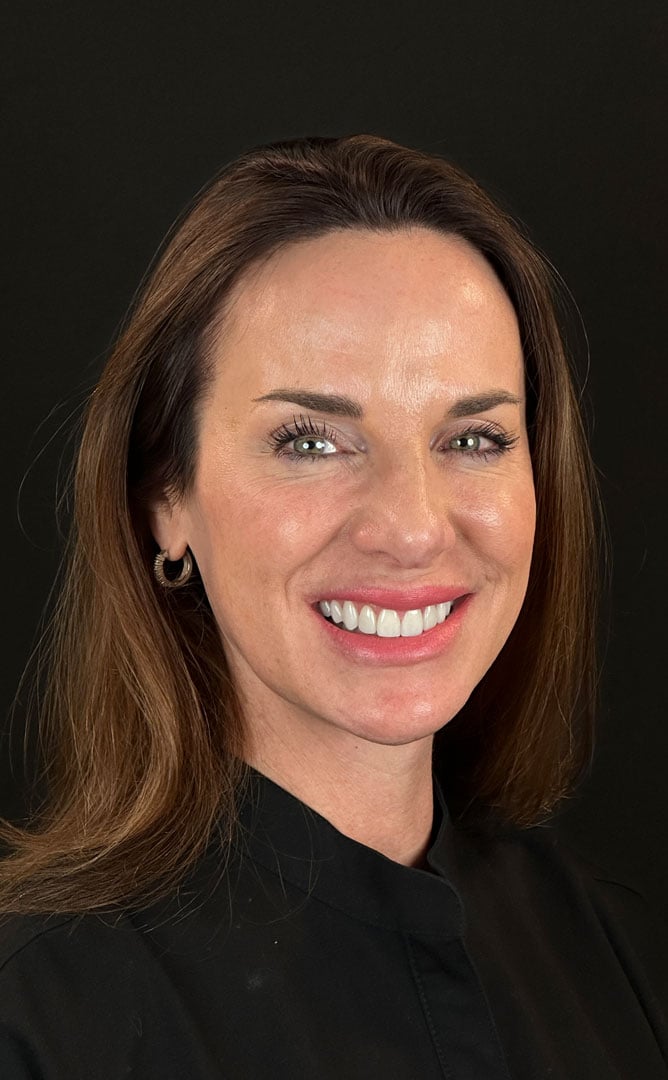 Happy Patient with natural looking veneers