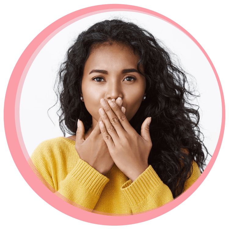young women covering mouth both hands