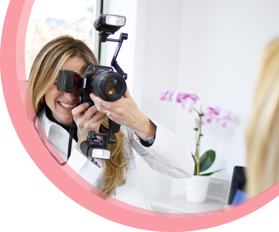 Dr Maria Cardenas taking a photo of a patient before her dental treatment.